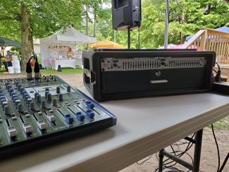 Rise & Ride Open Ranch 2022 | PreSonus AR12c mixer and dbx dual 15 band EQ with mic drawer. Mackie Thumps on K&M stands